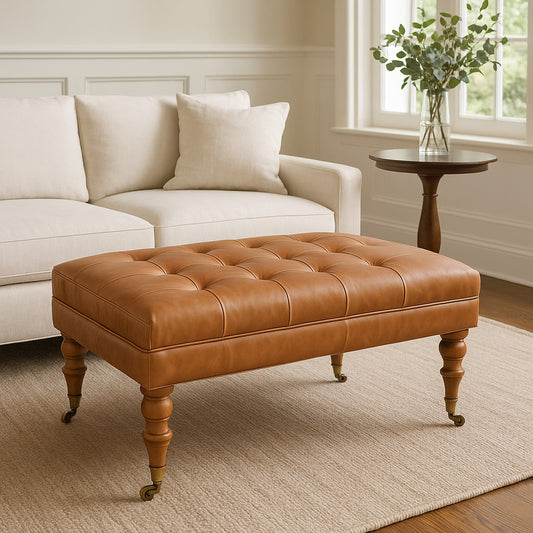 Sutton Buffalo Leather Tan Tufted Ottoman with Castor Legs