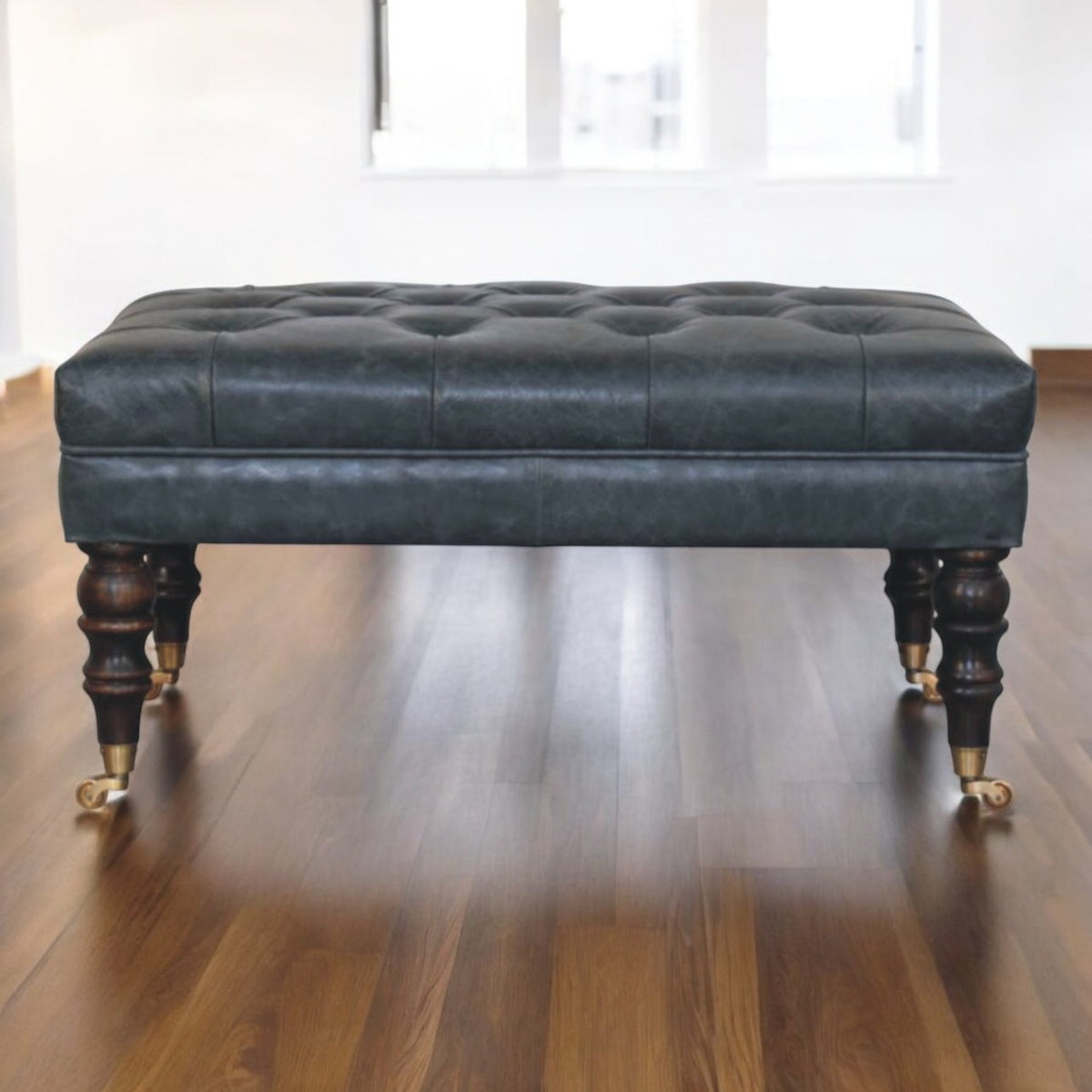 Sutton Buffalo Leather Teal Tufted Ottoman with Castor Legs